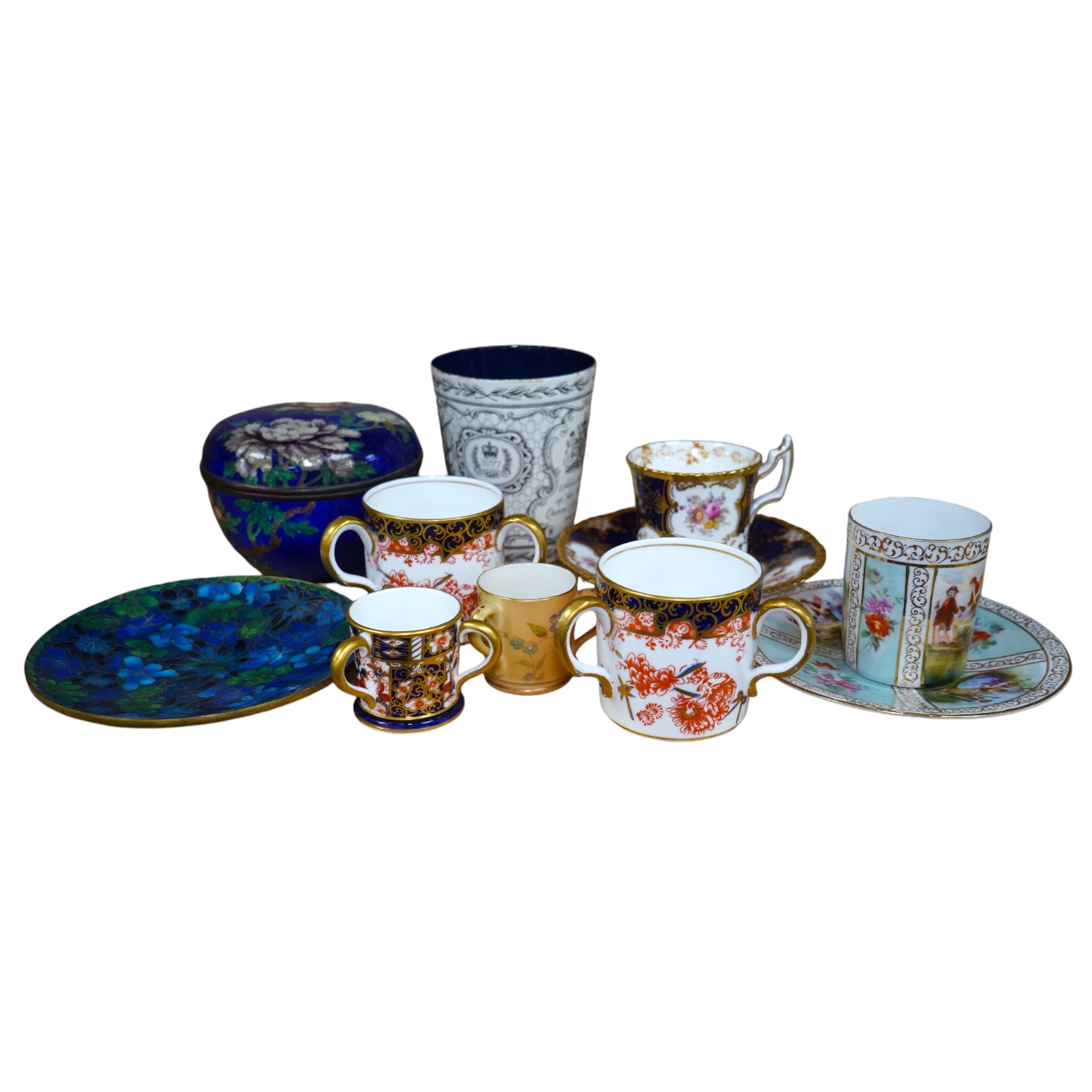 Porcelain and cloisonné ware to include a box and cover, a modern cloisonne dish, Royal crown Derby tygs and two cups and saucers, largest 10cm high. Condition - fair to good